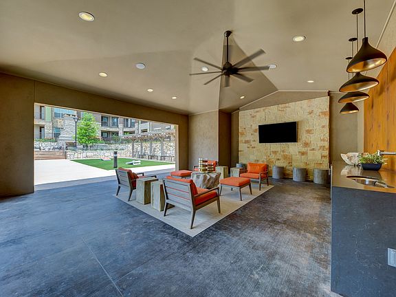 Outdoor Covered Entertainment Lounge with TV and Wi-Fi