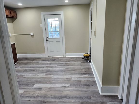 Kitchen are and door to outside deck