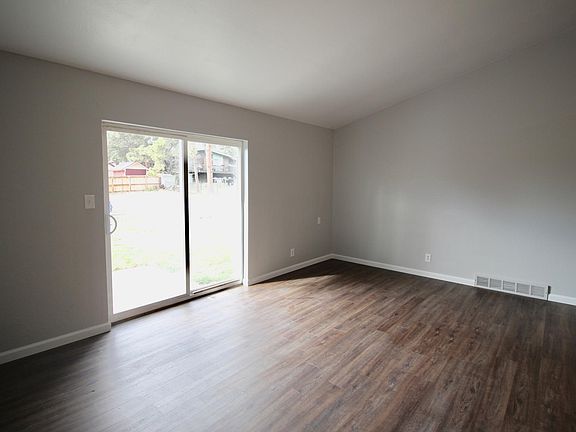 Family room with slider out into the yard.