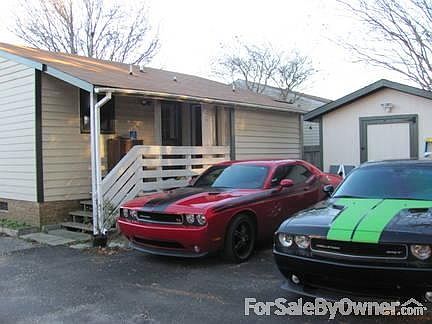 Rear view
						:
						10x14 storage shed with barn door for easy golf cart or motorcycle parking