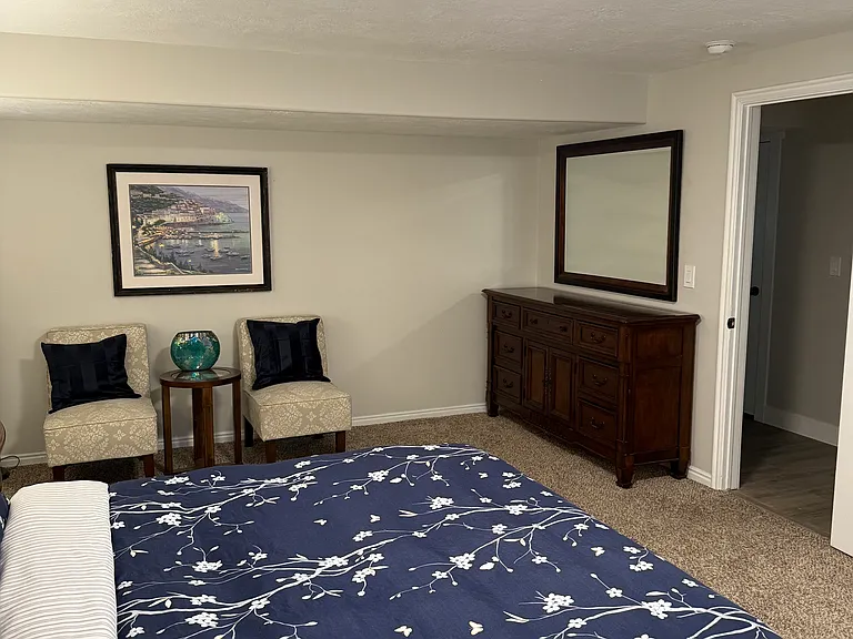 Seating area and dresser with mirror