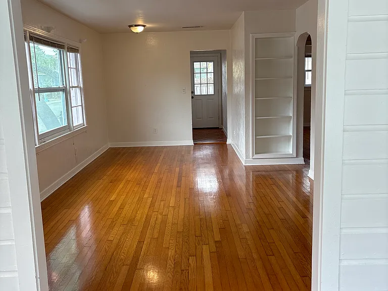 Living room from Florida room with beautuful oak wood floors