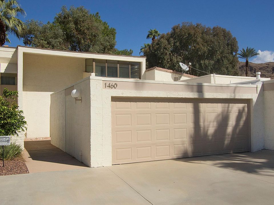 Face of the Condo and 2-Car Garage