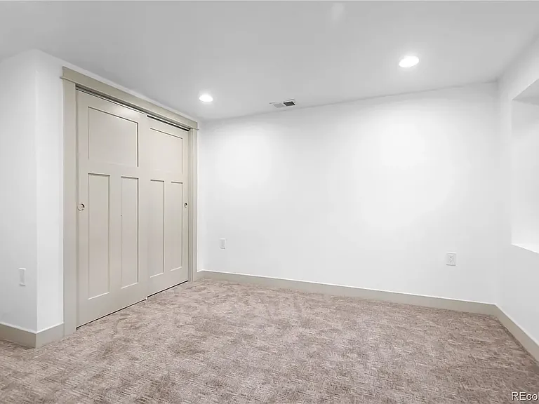 One of two basement bedrooms