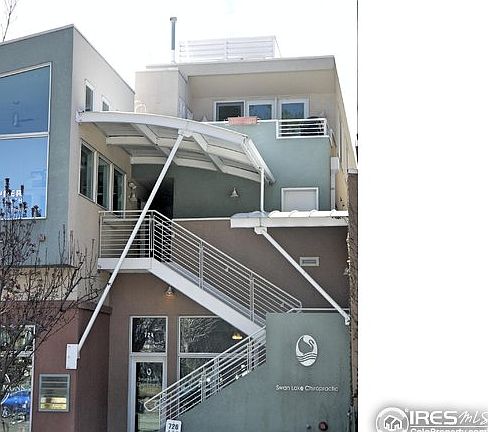 unit deck is upper corner of building on Pearl