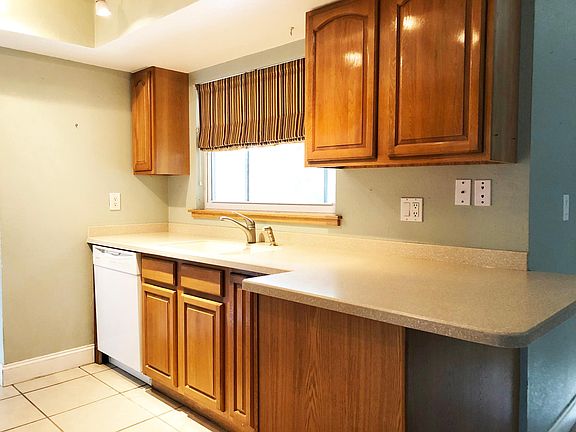 Kitchen Looking out over Lanai and Rear Yard

