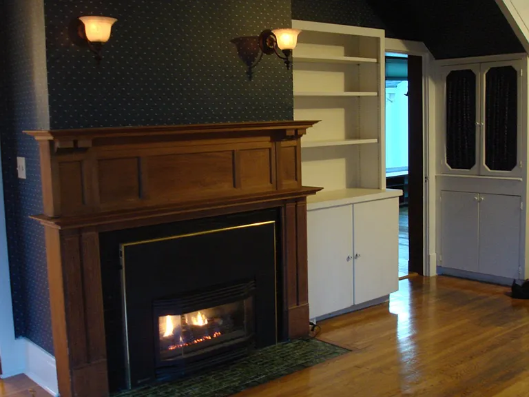 Fireplace Wood Mantle with Gas Fire
Built in Bookcases and Storage Cabinets