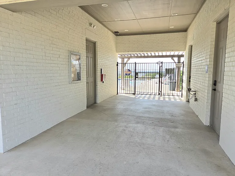 HOA pool entrance with restroom