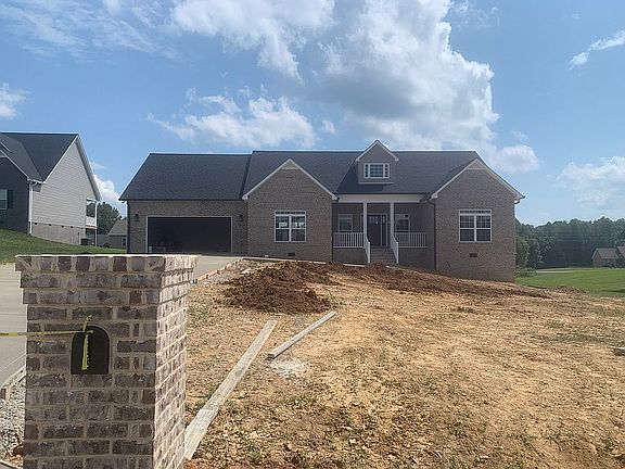 Front with brick mailbox 