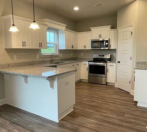 2nd image of 8008 Musclewood Drive