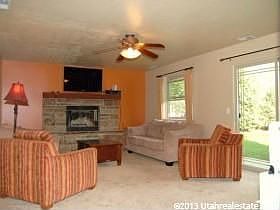 Family room with real wood burning fireplace