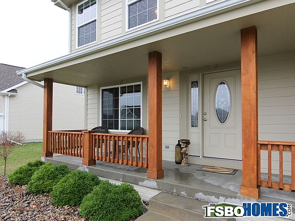 Covered Porch with Railing and Supports