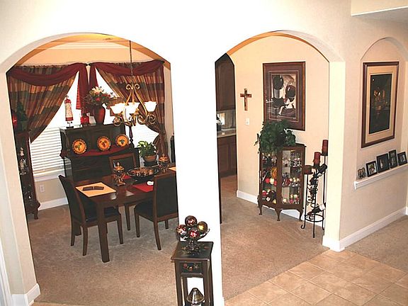 The architecture of this beautiful home makes every view pleasant as you look toward the formal dini