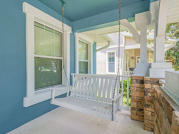 Large front porch with swing