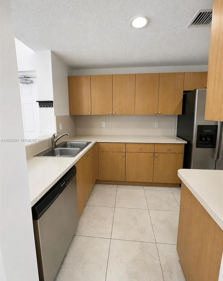 The Courts At Doral Isles — Photo 4