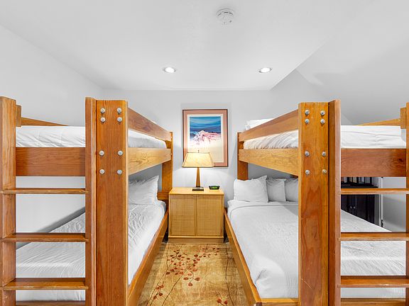 Bedroom 3 with 1 Queen Bed, 1 Twin-Over-Twin Bunk, and 1 Twin-Over-Full Bunk