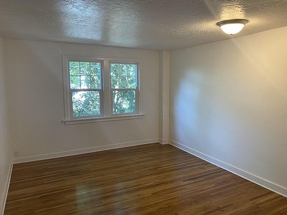 Living room with vinyl windows