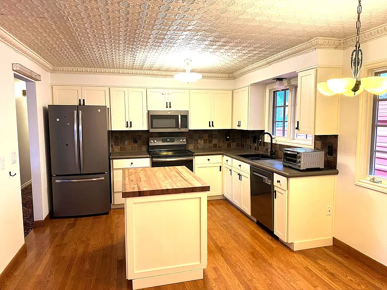Kitchen with island and breakfast corner