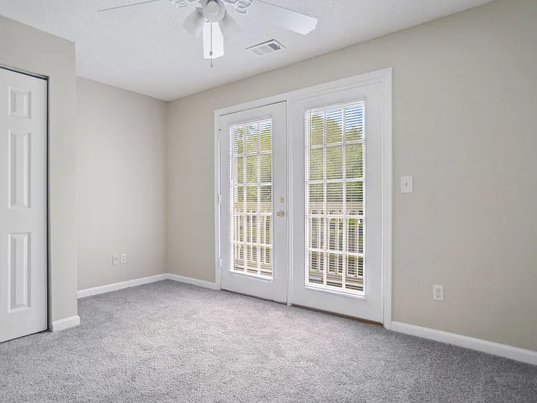 Bedroom with a balcony