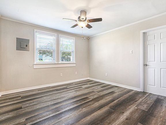 Spacious living room with lots of natural light.