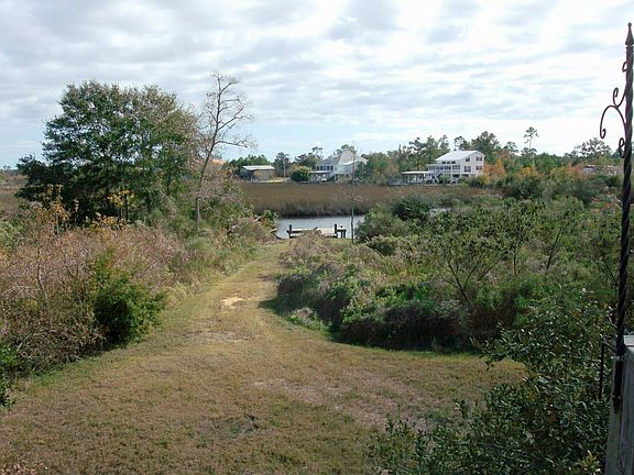 Large yard and dock on breath bayou!