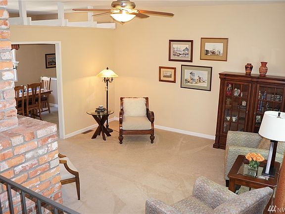 Upper view from entry shows the custom millwork in the transition from the formal living room to the Great Room.