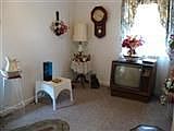 2nd bedrm on 1st flr was used as a sitting rm features hdwd flrs under carpeet