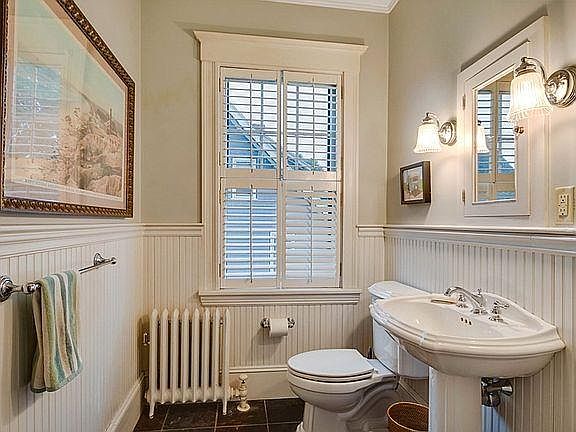 Full bath on main floor with tub and shower