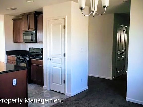 Dining area to kitchen and hallway view