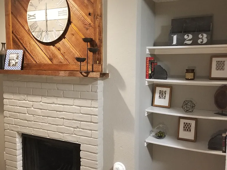 Oakwood Creek Apartments fireplace and shelving