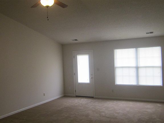 Front room with vaulted ceiling