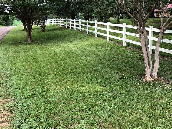 Fence across front of proper