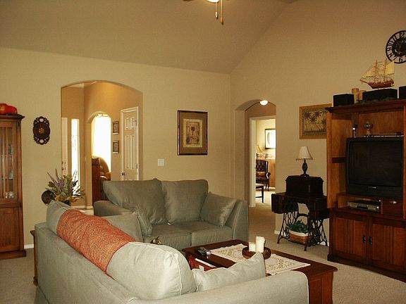 Family Room has Brick Fireplace