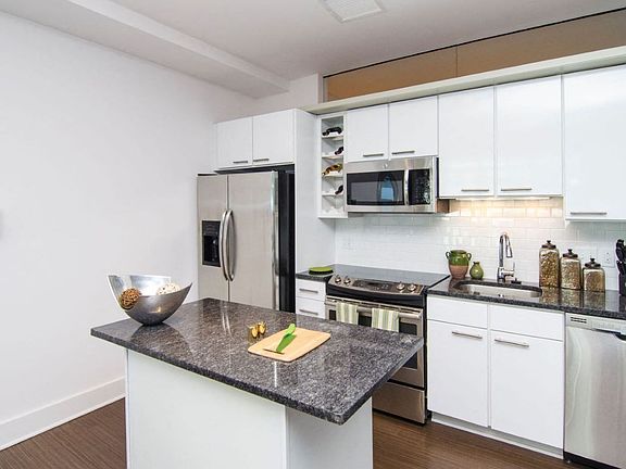 Kitchen with granite countertops and stainless steel appliances