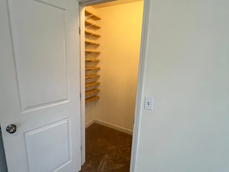 Customized closets in main bedroom