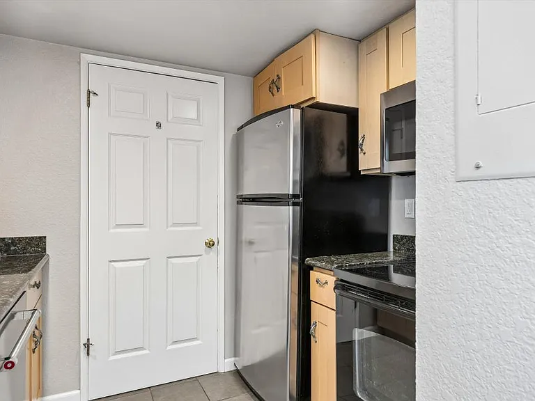 Kitchen w/ access to W/D