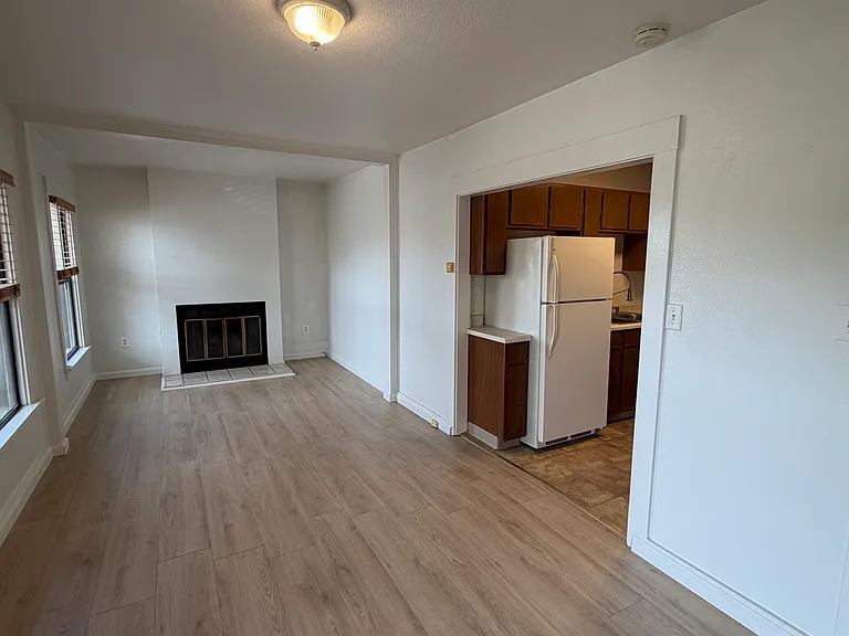 Living room opening to Kitchen