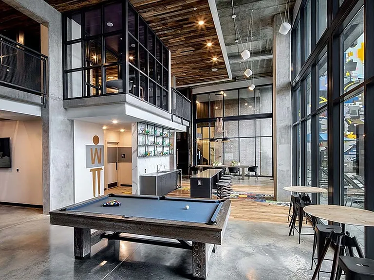 Clubroom with billiards and arcade games