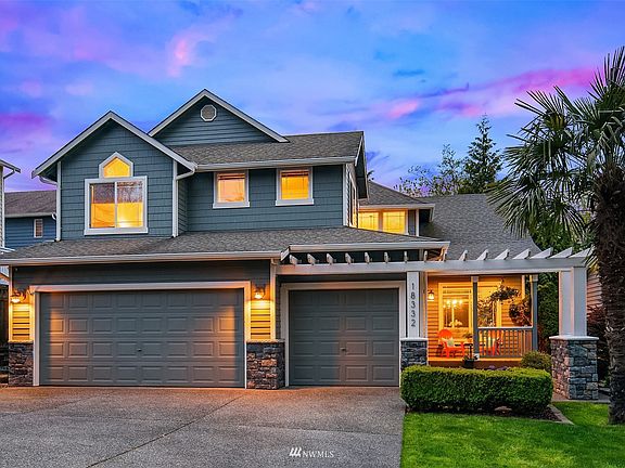 3 car garage and covered front porch