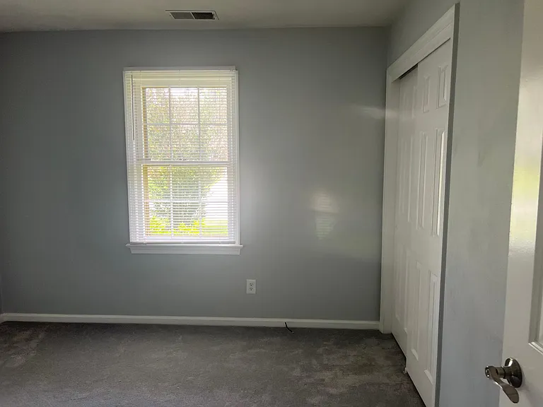 1st bedroom across from hall bath