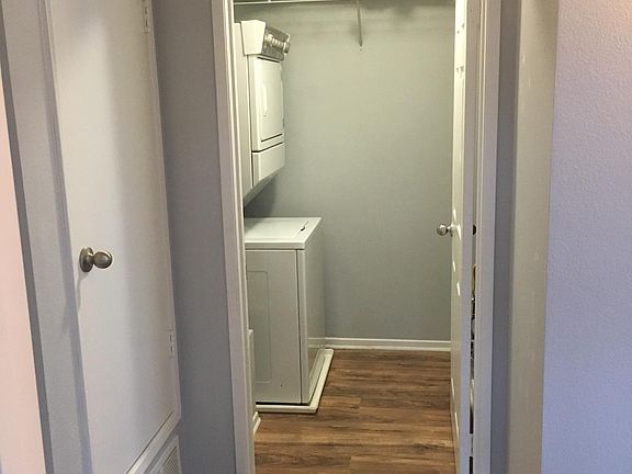Stackable washer / driver inside the unit. Storage closet room on the left