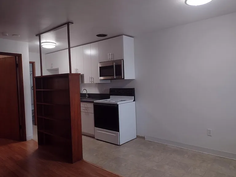 built in microwave & full size appliances. Small dining area can be used to extend the kitchen or have work space.