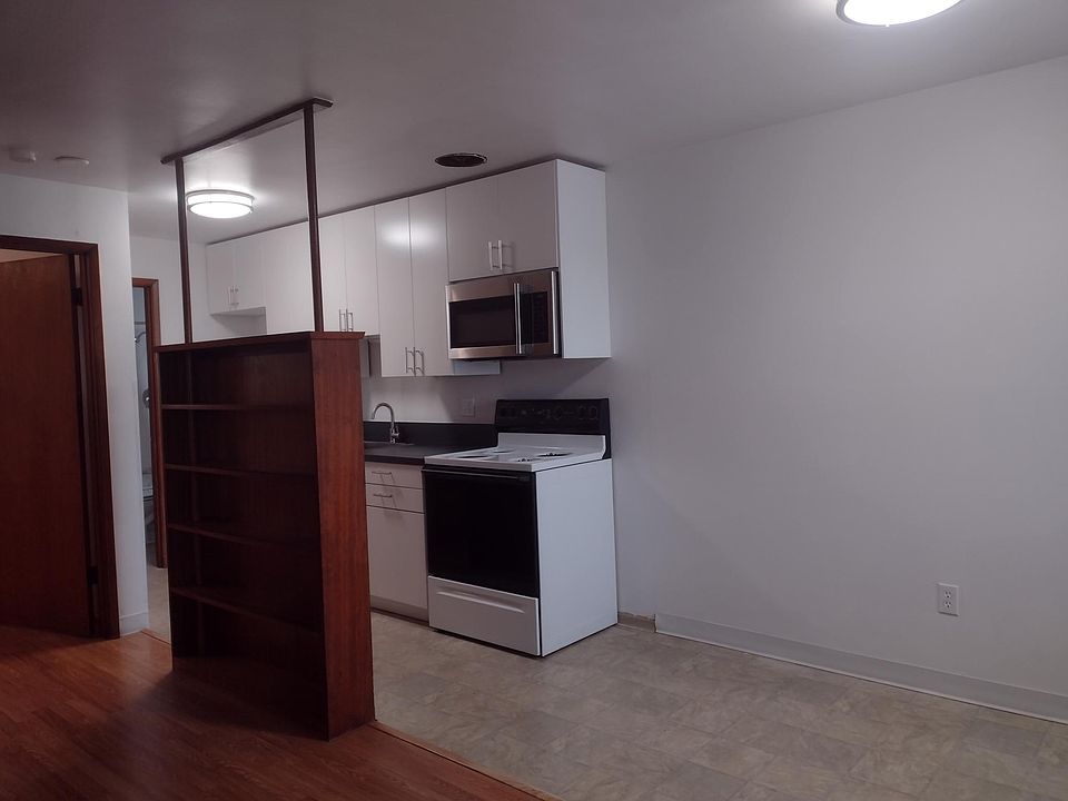 built in microwave & full size appliances. Small dining area can be used to extend the kitchen or have work space.