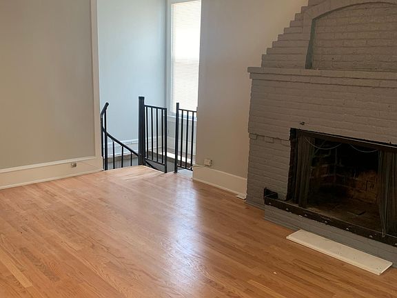 living room with faux fireplace