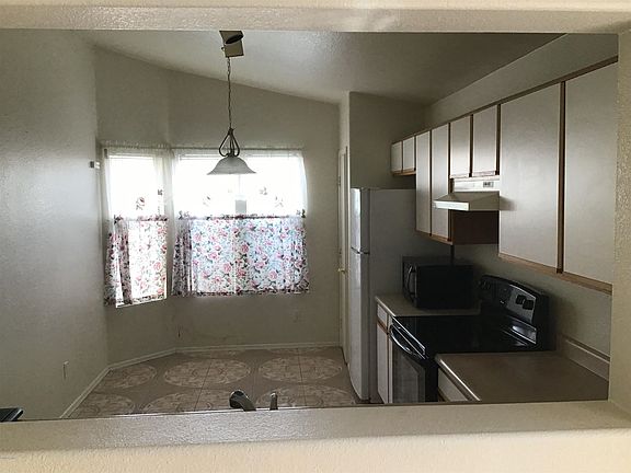 4th image of 6993 W Gardenia Ave