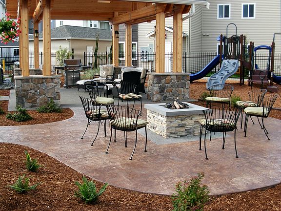 Outdoor lounge complete with gazebo and firepit