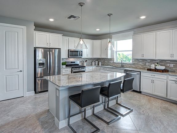 Kitchen with stainless steel appliances and optional center island
