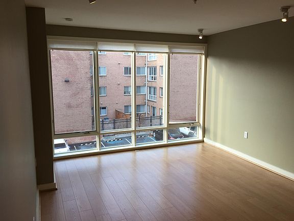 living room windows (west-facing for great sunlight, especia