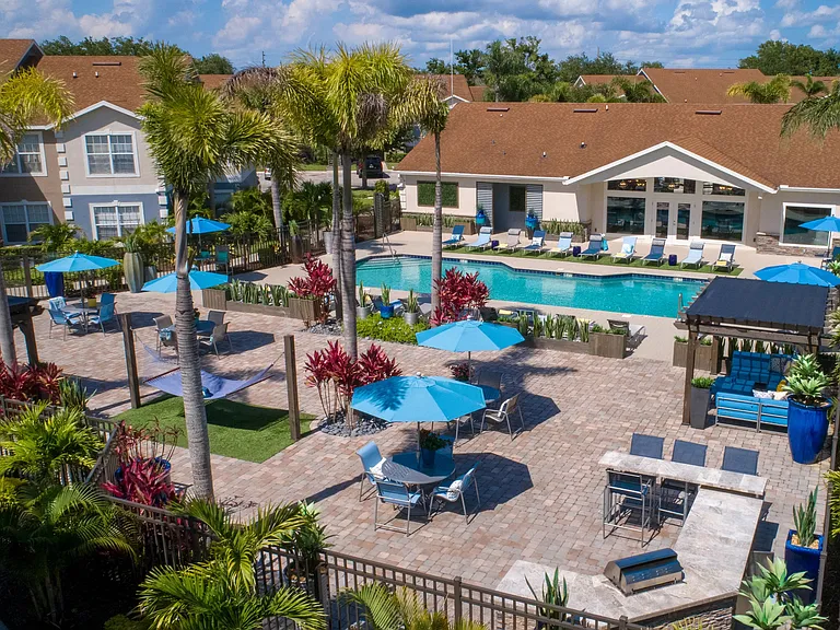 Dive into our poolside oasis, where the expansive sundeck and serene surroundings create the perfect at-home relaxation spot for your weekends.