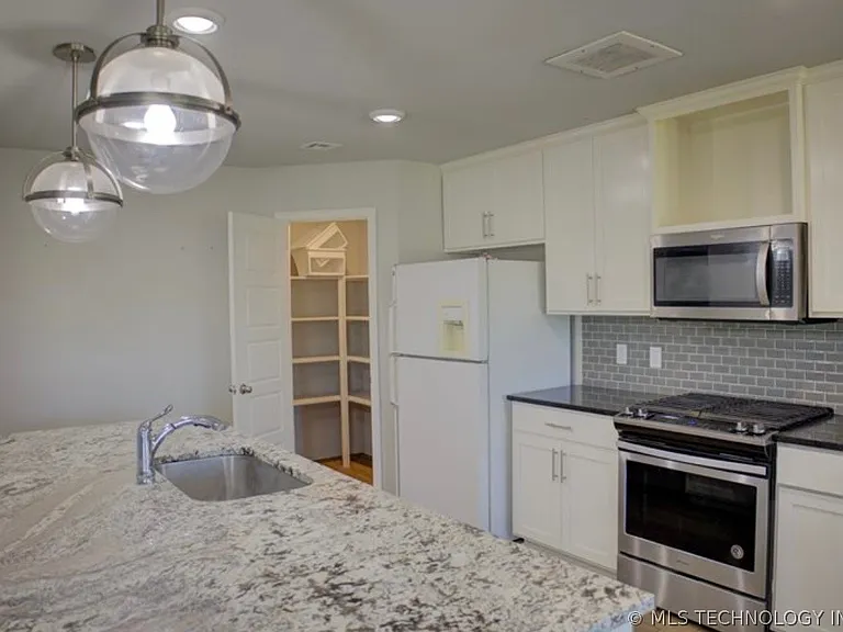 7012 S Elder Ave — Photo 16